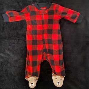 here I have a warm onesie piece size 0-3 months, Christmas theme red and black